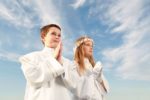 boy and girl in first holy communion, purity conscience, praying hands